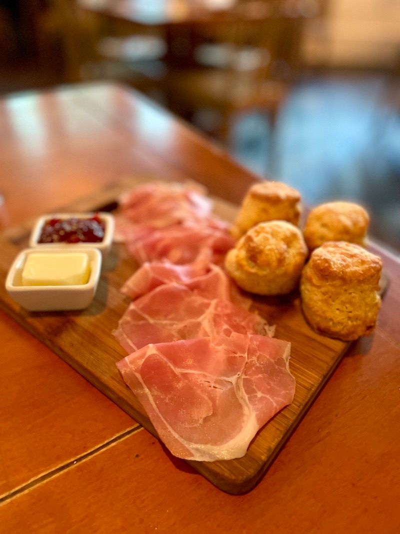 Country ham and buttermilk biscuits with butter and jam