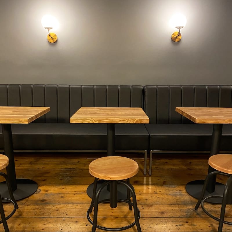 tables and banquettes at the rabbit hole