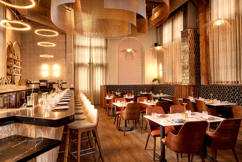 Alora’s interior features contrasting shapes and cozy seating. Photo: ⓒ Neetu Laddha.