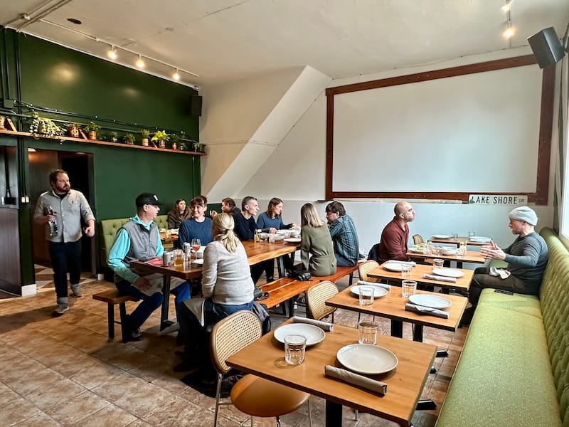 The back room where they’ll be screening movies on the wall.