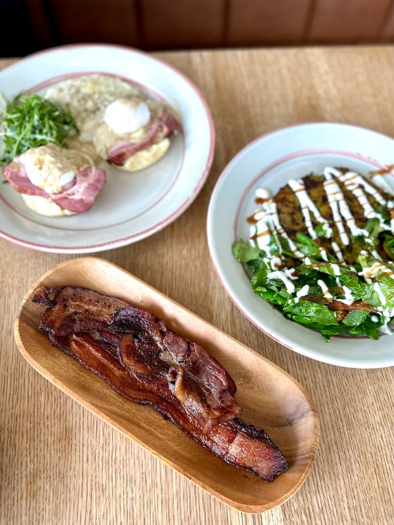 House bacon, samusa potato pancake, and eggs Benedict at Early to Rise. Photo: © tablehopper.com.