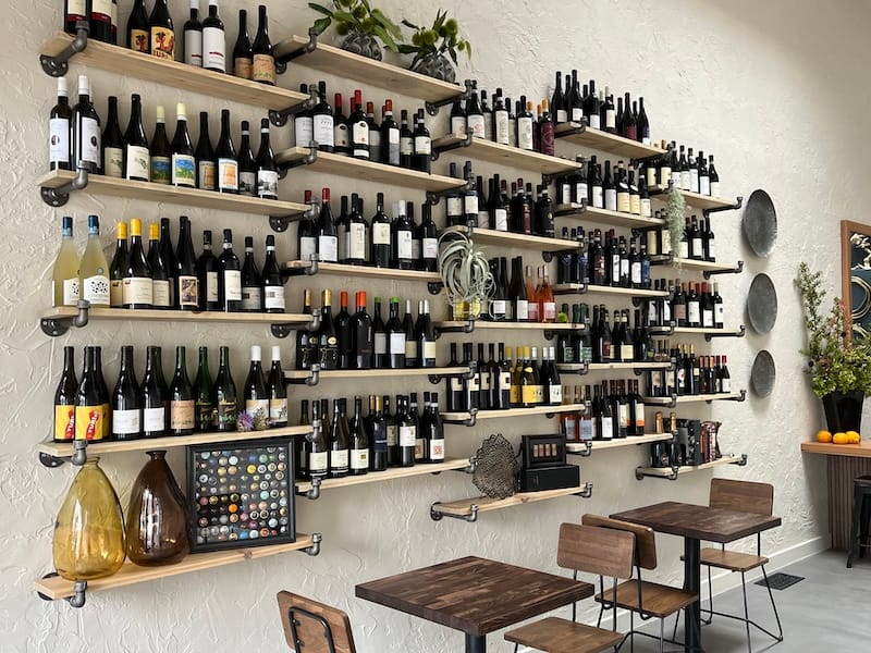 The wall of wine for retail sale.&nbsp;Photo courtesy of Binu Bonu.