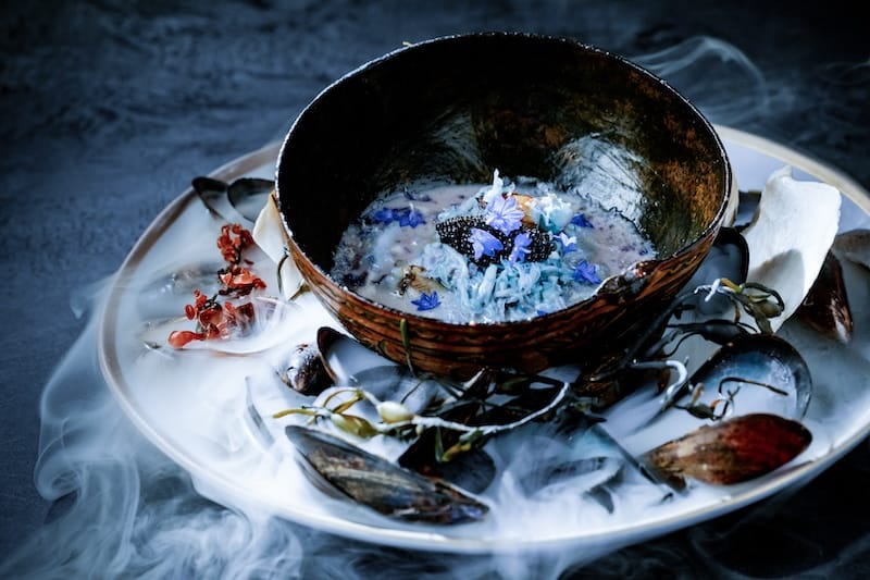 A blue dish from Merchant Roots’ current Color Theory theme. Photo courtesy of Merchant Roots.