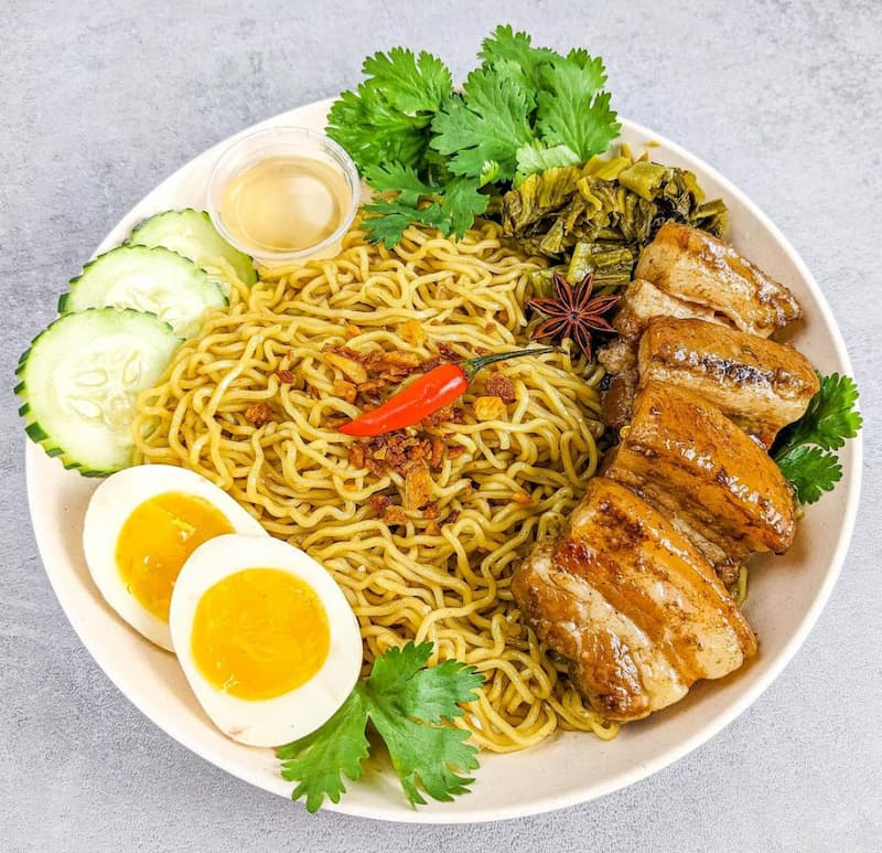 A recent pork belly noodles dish from Basil the Bold—here’s hoping it returns to the menu soon! Instagram photo via @basiltheboldthai.