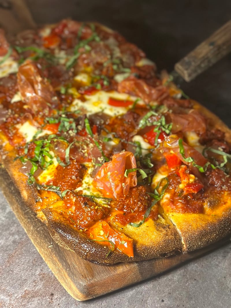 The Calabrese Testadura&nbsp;pinsa at Unwine’d. Photo: © tablehopper.com.