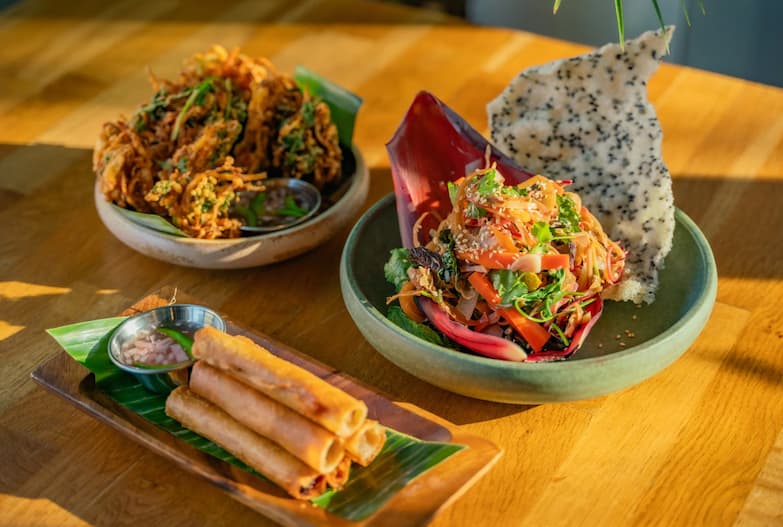Pork lumpia and ukoy (shredded root vegetable salad) are some of the items available now at Understory. Photo: ⓒ Parchita Studios.