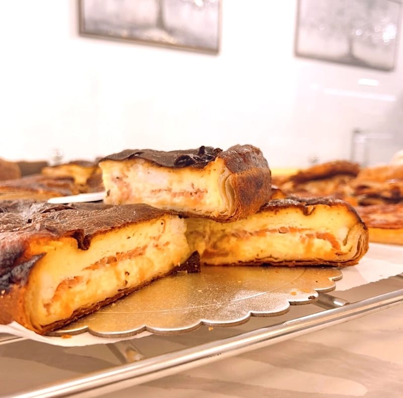 The delicious-looking salmon quiche (warm from the oven) at KC Paris Desserts. Instagram photo via @kcparisdesserts.