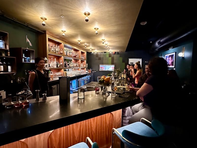 Hope to grab a seat at the main bar and get ready to make some new friends. Photo: © tablehopper.com.