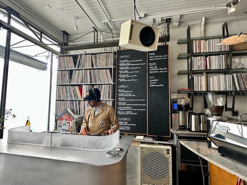 Side A moved Universal Cafe’s entrance to the other side and installed this custom DJ booth. Photo: © tablehopper.com.