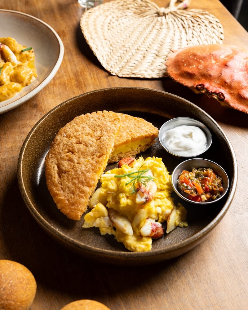 Pacifico’s arepa de huevo with Dungeness crab omelette. Photo: LemonAd Media.