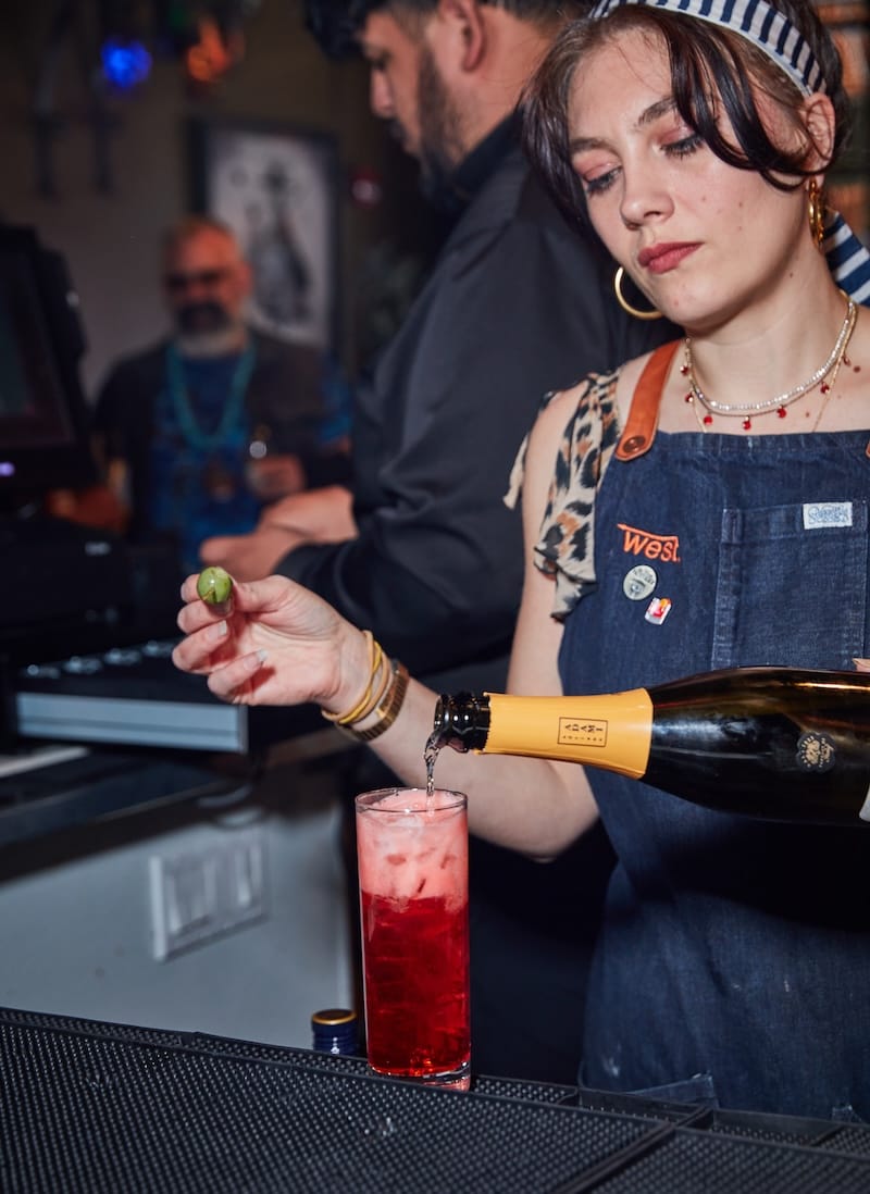 Stephanie Gonnet making a Venetian Spritz at Bohemian Sunday. Photo: Molly DeCoudreaux Photography.