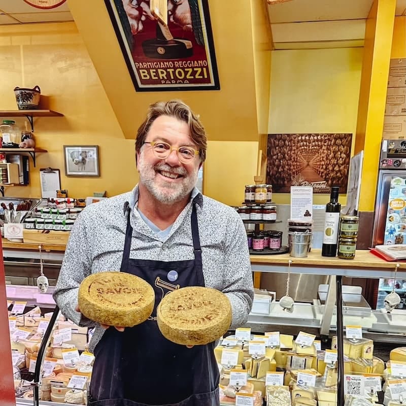 Hey, Ray, here’s to 20 years! Ray Bair, owner of Cheese Plus. Photo via Cheese Plus’s Facebook page.