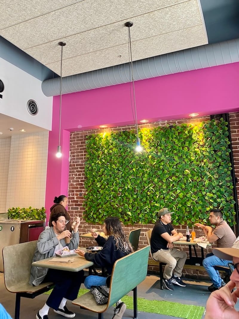 The bright pink walls in the new Al Pastor Papi location. Photo: Olivia Casellini for tablehopper.com.