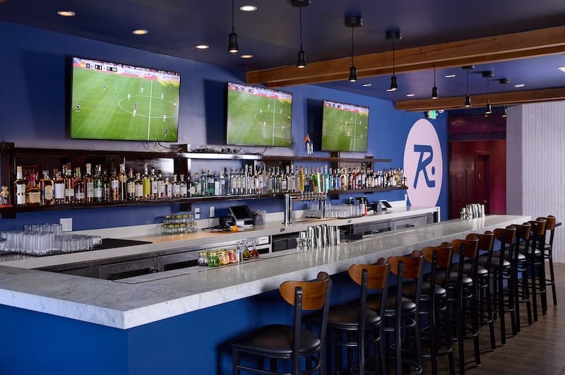At last, a place to watch women’s sports: the bar at Rikki’s! Photo: Molly DeCoudreaux.