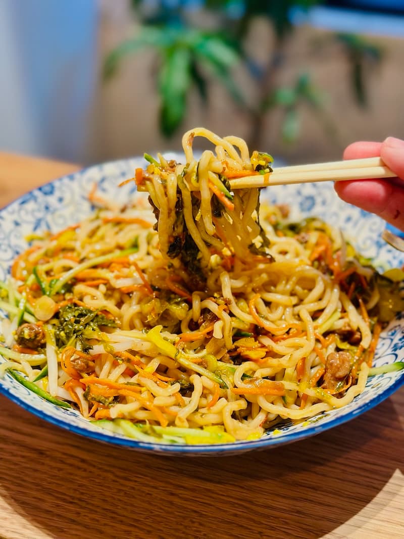 You’ll mix your bowl of noodles and toppings together. Photo: © tablehopper.com.