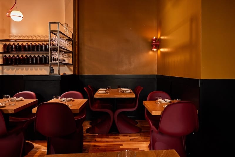 The Panton-inspired chairs in the back of Beretta’s updated dining room. Photo: Michelle Min.