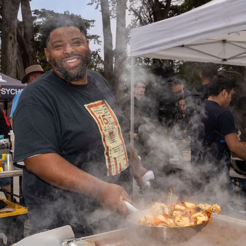 Mr. Gumbo cooking at his birthday bash. Photo: Don Bowden, American Legal Video Services.