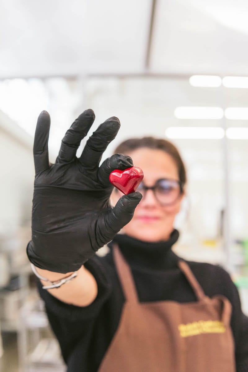 Shekoh Moossavi with her hand-crafted Persian rose bonbon. Photo: ⓒ Brianna Danner.