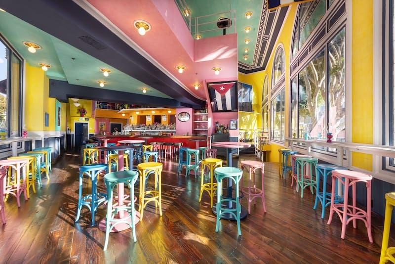 The sunny, street-level Barra Principal&nbsp;is the perfect place to enjoy a daiquiri and dopamine hit from the cheerful colors. Photo courtesy of Long Weekend.
