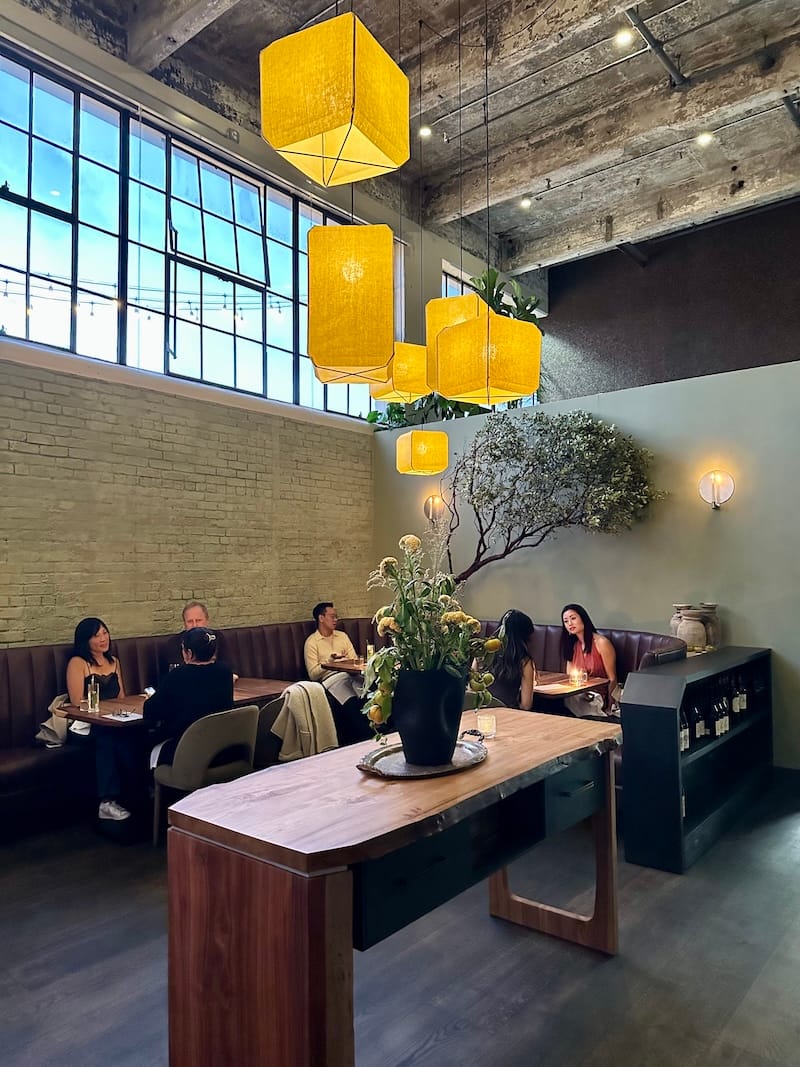 The subdued dining room now highlights natural tones and materials. Photo: © tablehopper.com.