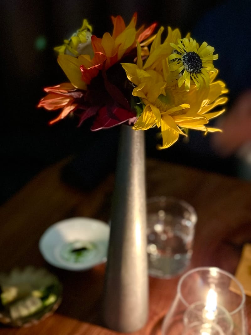 Your first bite is hiding in the bouquet of sunflowers. Photo: © tablehopper.com.