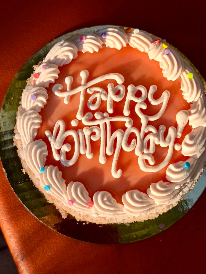 My guava-chiffon birthday cake—check out that next-level lettering! Photo: © tablehopper.com.