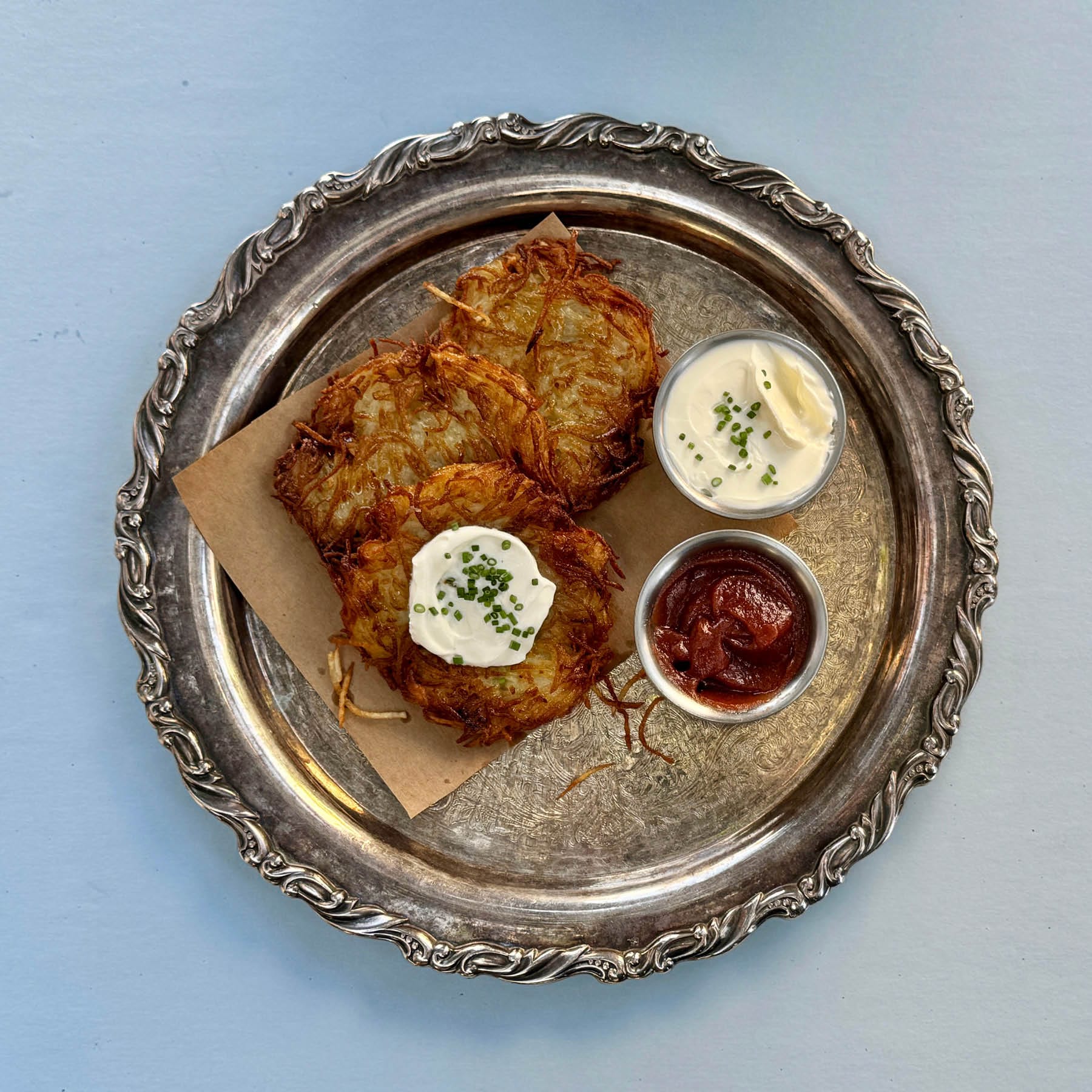 Delfina’s flash-frozen latkes and accompaniments. Photo courtesy of Delfina.