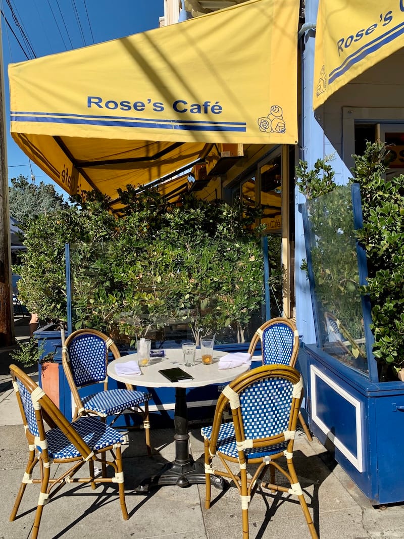 An outdoor table at Rose’s Café. Photo: © tablehopper.com.