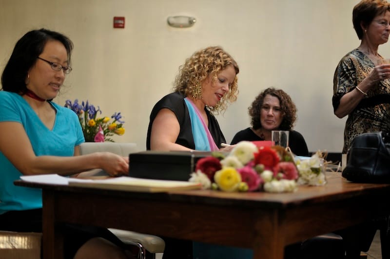 Signing books at my book release party at Orson, with my incredible editorial assistant Daisy Chow, Carole proudly looking on, and my Mom having a good time. Photo: Andrea Scher.