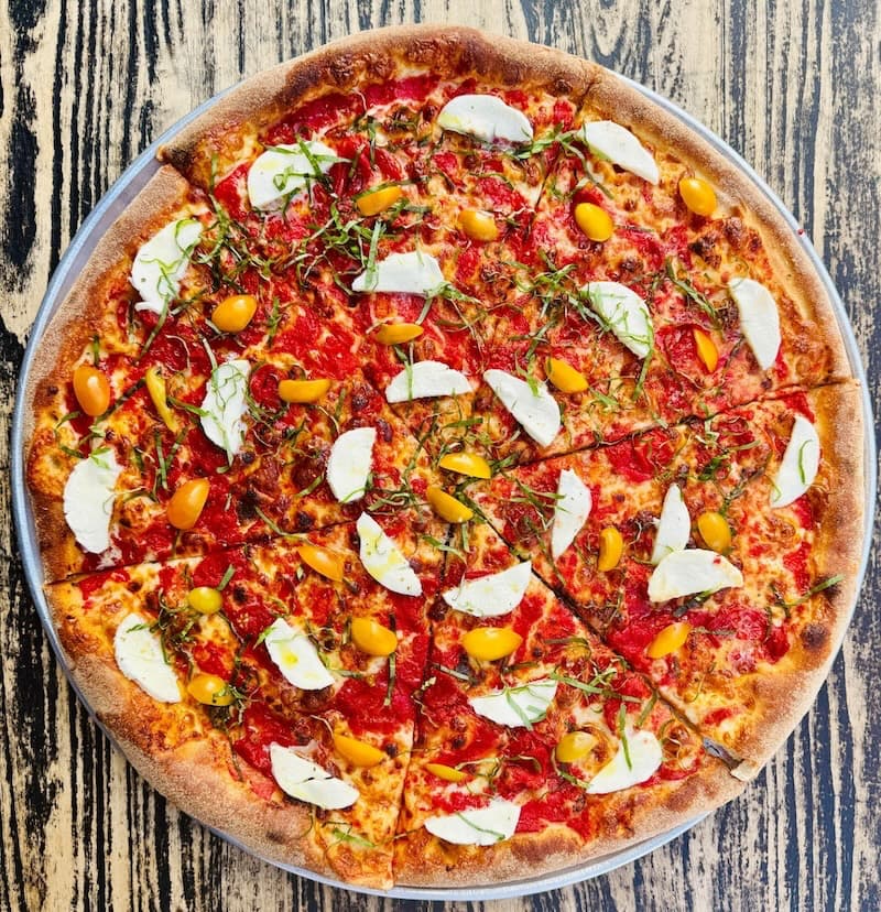 Slice House by Tony Gemignani is celebrating 15 years with a special pie: the Super Gold Margherita. Photo courtesy of Slice House.