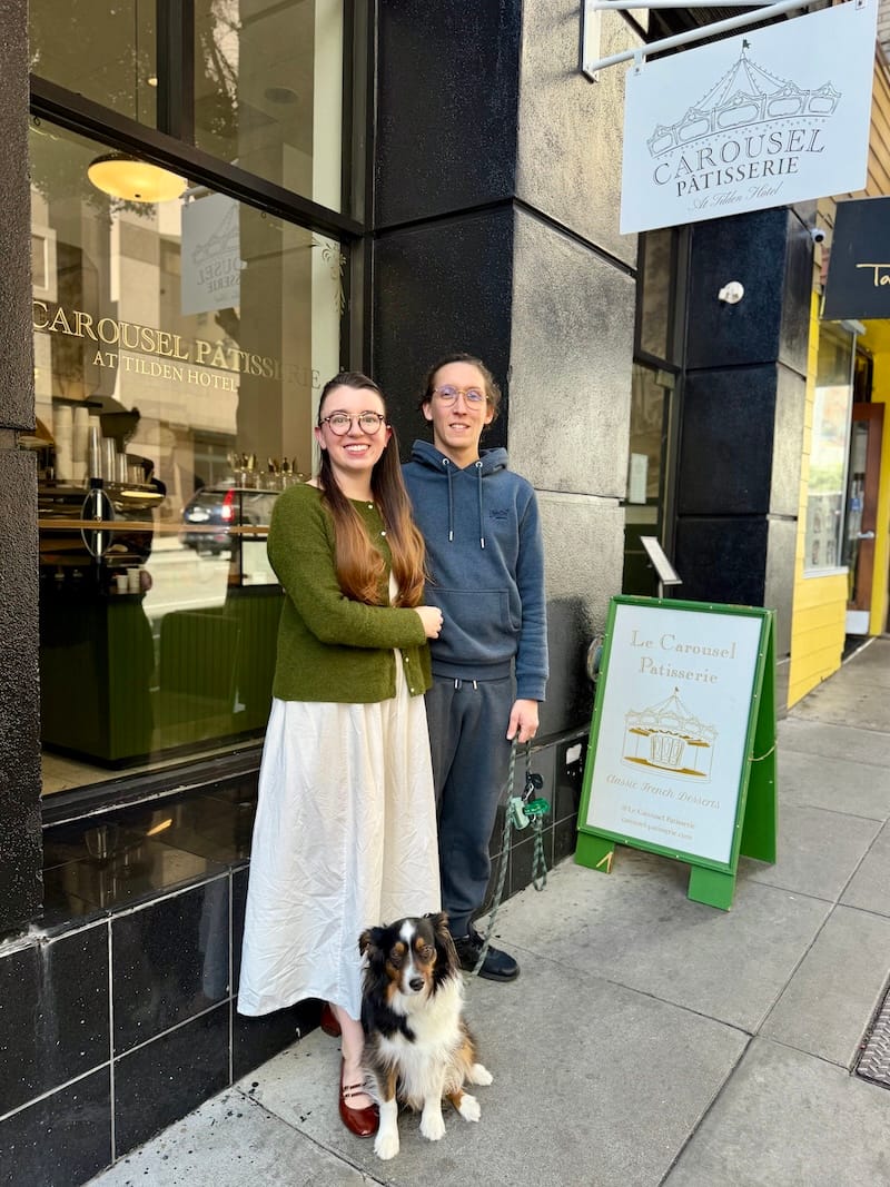 Claire and Jeremy Mullet (and their adorable dog, Merguez) in front of Le Carousel Patisserie. Photo: © tablehopper.com.