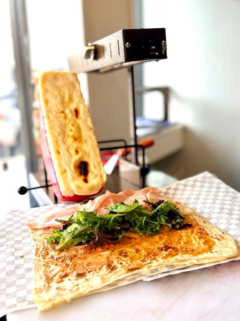 The golden Fontina waterfall is ready to cascade off the raclette machine. Photo: © tablehopper.com.