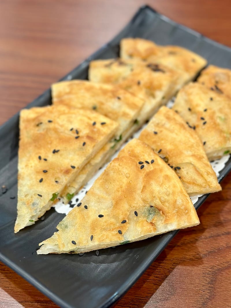 The flaky and light scallion pancake from Gourmet Carousel. Photo: © tablehopper.com.
