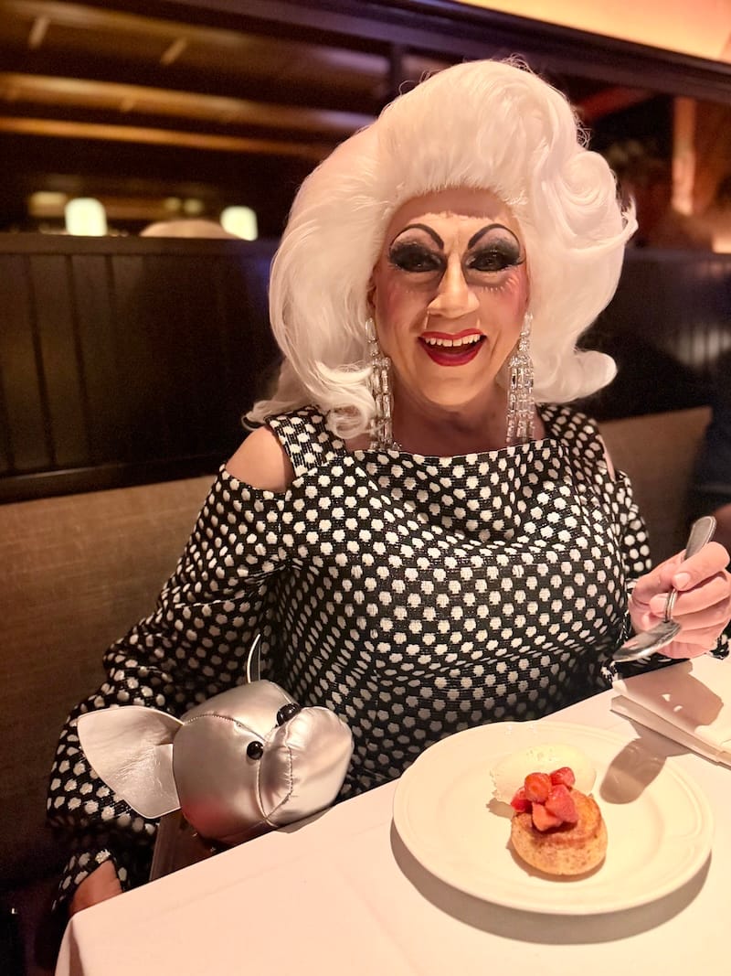 My fabulous dinner date, Miss Juanita MORE!, and her pooch purse. Photo: © tablehopper.com.