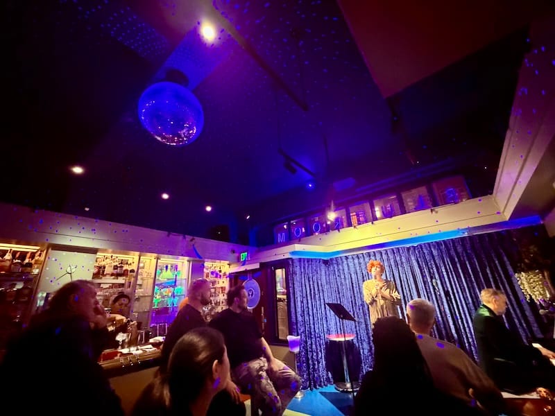 Everyone sparkles under the blue disco ball at Stookey’s Blue Room. Photo: © tablehopper.com.