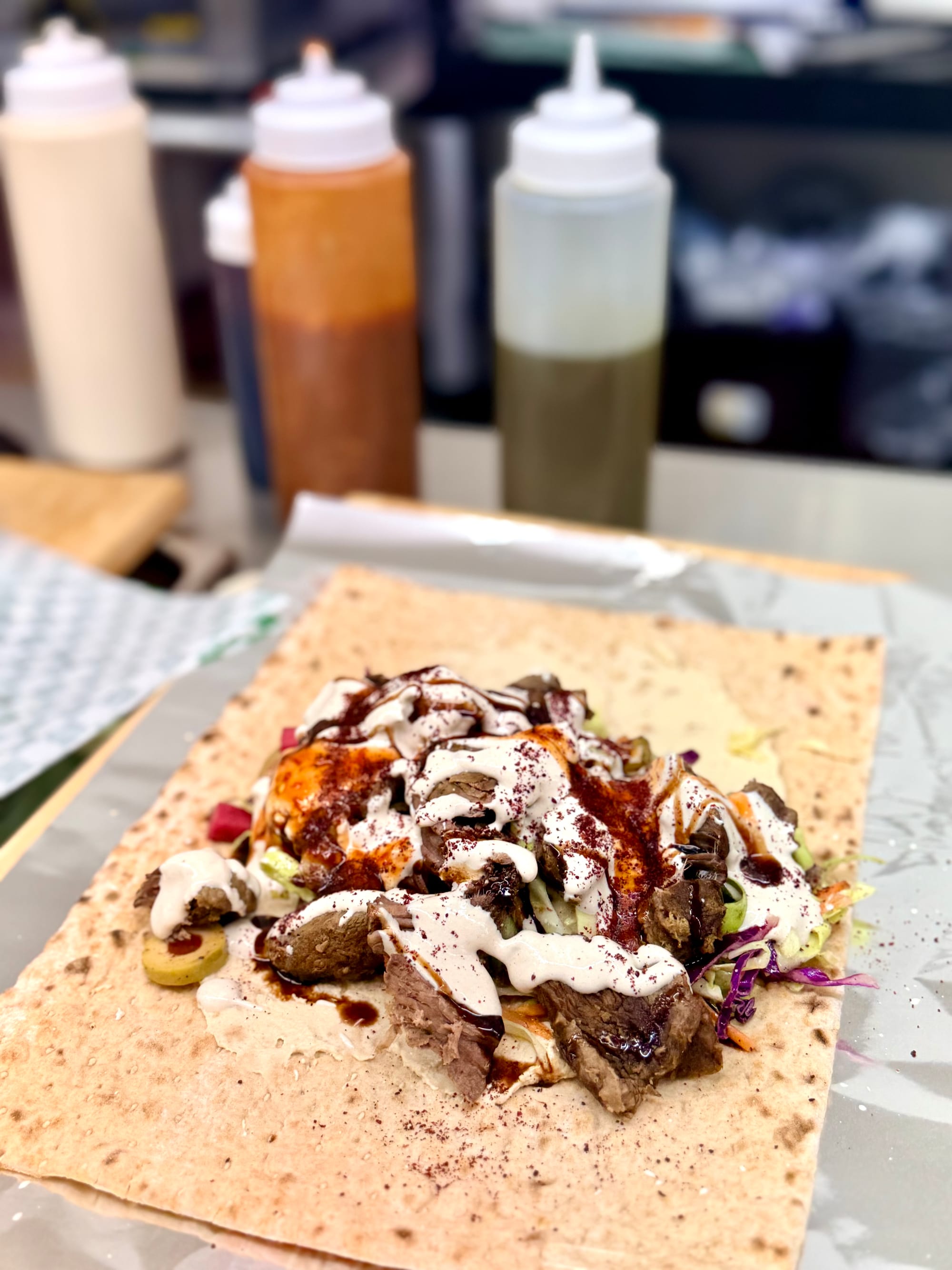 The stacked lamb wrap before getting rolled up. Photo: © tablehopper.com.