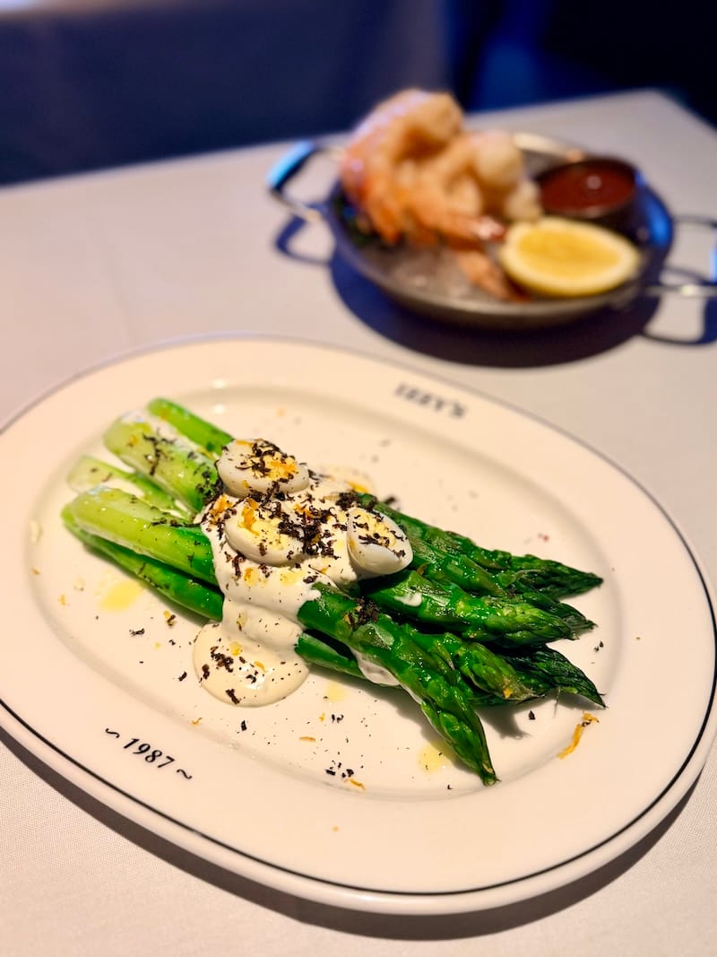 Chilled asparagus with quail eggs and black truffle. Photo: © tablehopper.com.