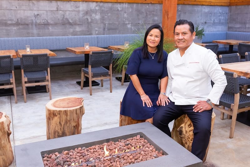 Shu and Carlos Altamirano on the patio of Altamirano Restaurant & Bar. Photo: Ian Chin Photography.