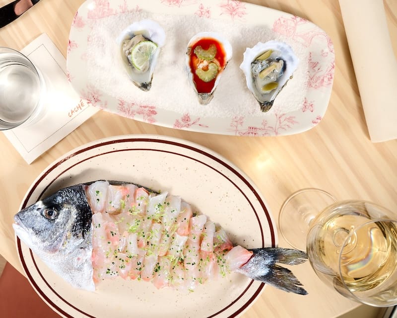 Caché’s sea bream sashimi for two and oysters. Photo: Joseph Weaver.