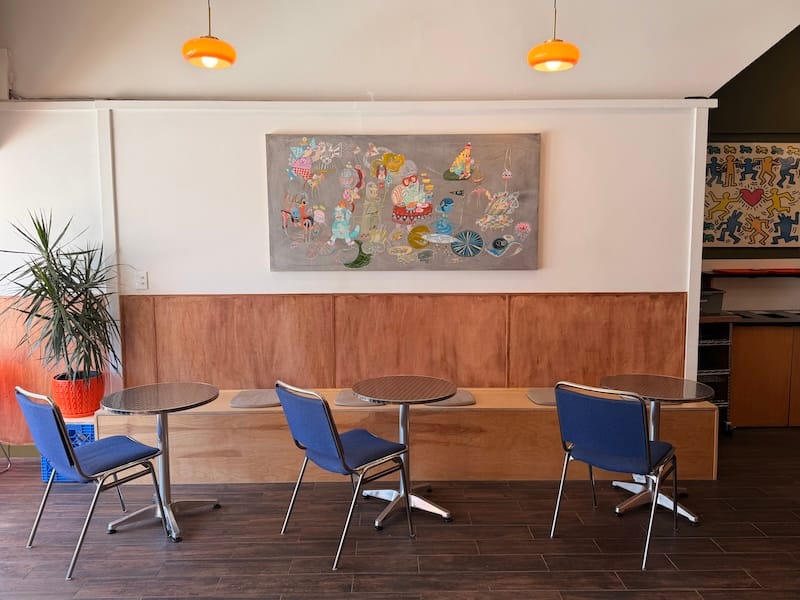 Some seating and artwork by KEFE. Photo courtesy of Hologram.