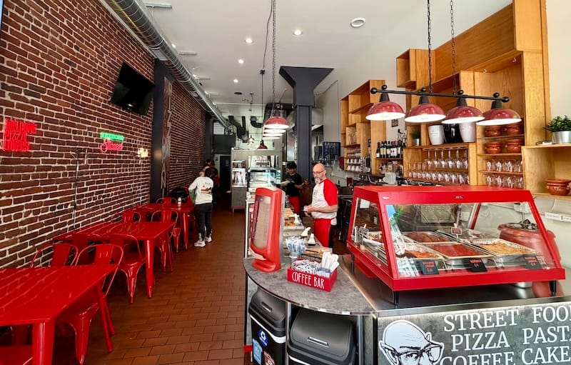 The interior (with plenty of zippy Italian red). Photo: © tablehopper.com.