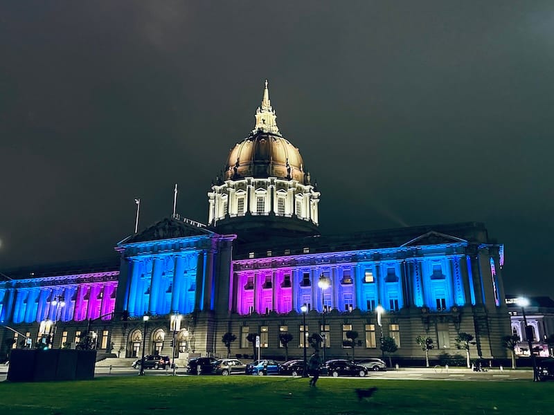 SF City Hall lit up for the SF Trans March in 2023. Photo: © tablehopper.com.