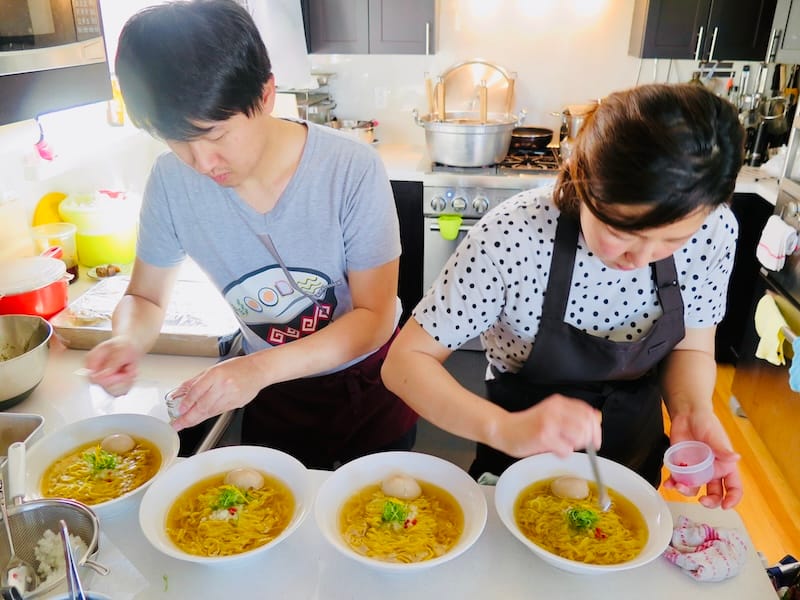 Clint and Yoko Tan serving ramen out of their home at their Feastly pop-up in February 2018. Photo: © tablehopper.com.