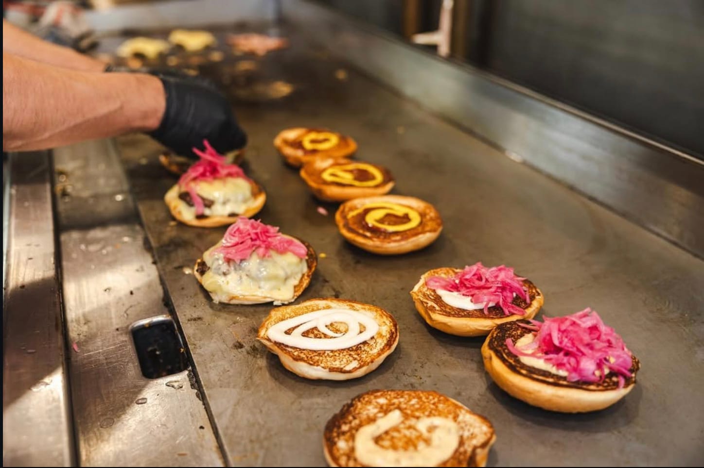 Could pickled onions beat traditional pickles as a burger topping? Instagram photo via @iggysburger.