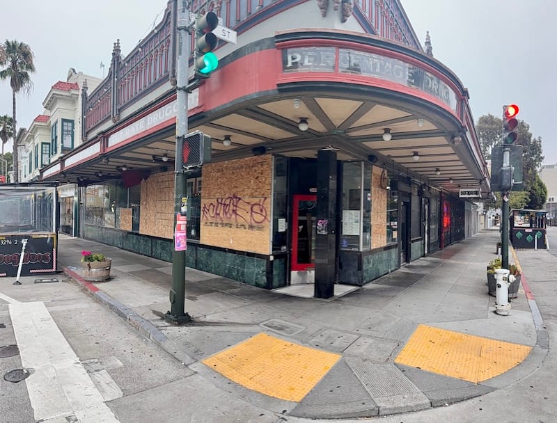 You can see how so many windows of the corner restaurant are boarded up (and already tagged, of course). Photo courtesy of Basil Racuk.