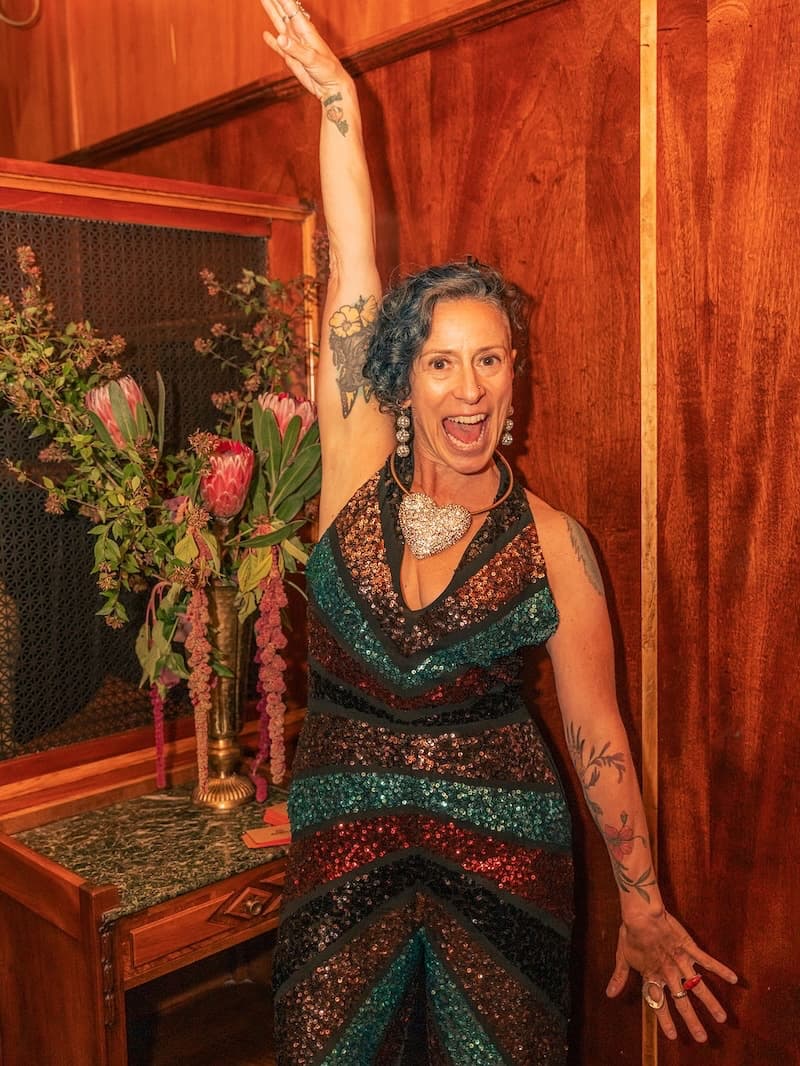 Sparkly door person Marya Kahan (book her for event help and emceeing!). Photo: Ashley Rose Conway—Craft & Cocktails.