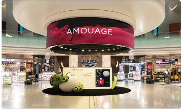 A large stuffed animal in a mall

Description automatically generated