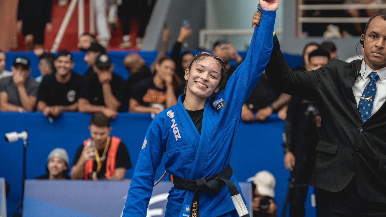 Ashlee Funegra with her hand raised at the 2026 Brasileiro
