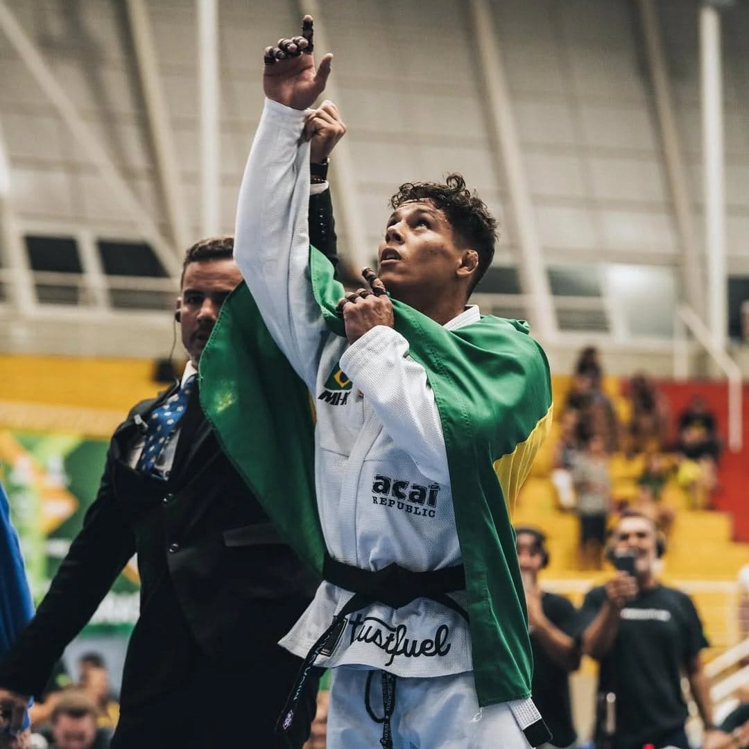 Mica Galvão celebrates with the Brazilian flag