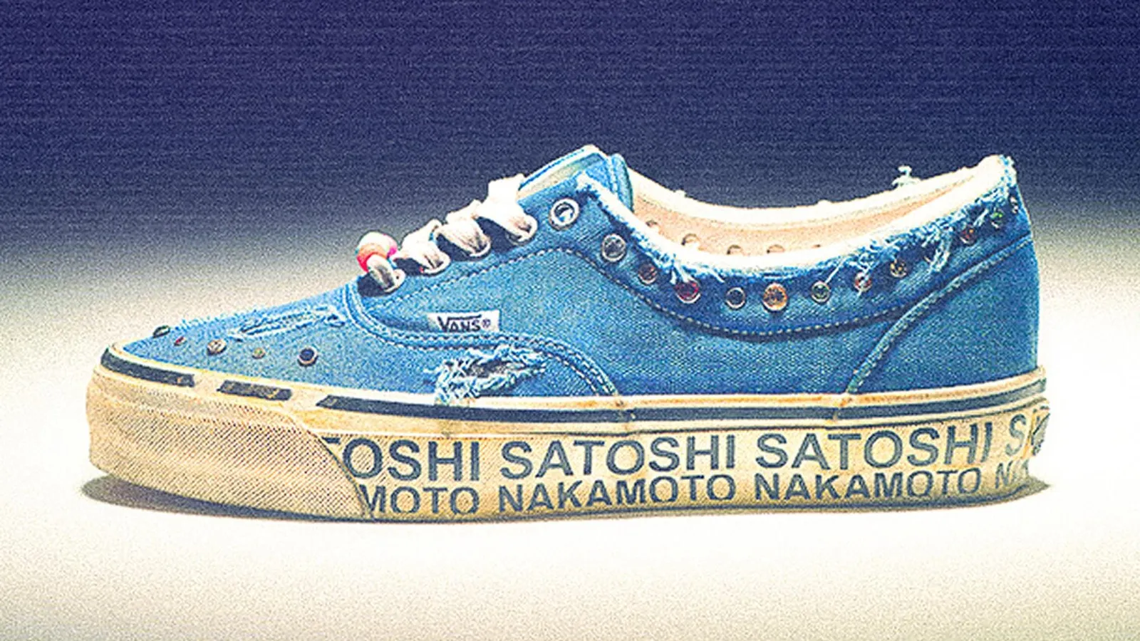 Side view of the navy OTW by Vans x Satoshi Nakamoto Era 95 Gems with frayed canvas, gemstone eyelets, beaded laces and a yellowed sidewall printed Satoshi Nakamoto